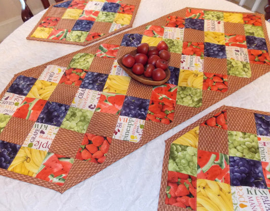 Table Runner Quilt, Table Topper Centerpiece, Fruit Quilt, Grape, Strawberry, Blueberry, Banana, Watermelon, brown, tan, red, green, yellow.